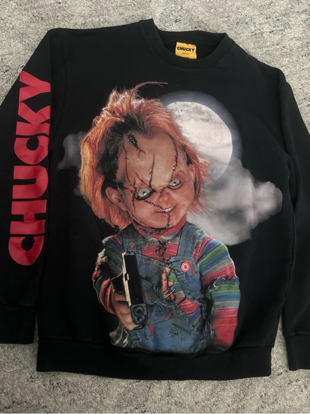 Chucky Graphic Sweatshirt Size L has a small mark as shown on picture